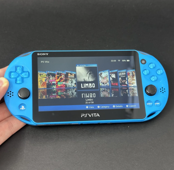 PS Vita 2000 with Games and Charger