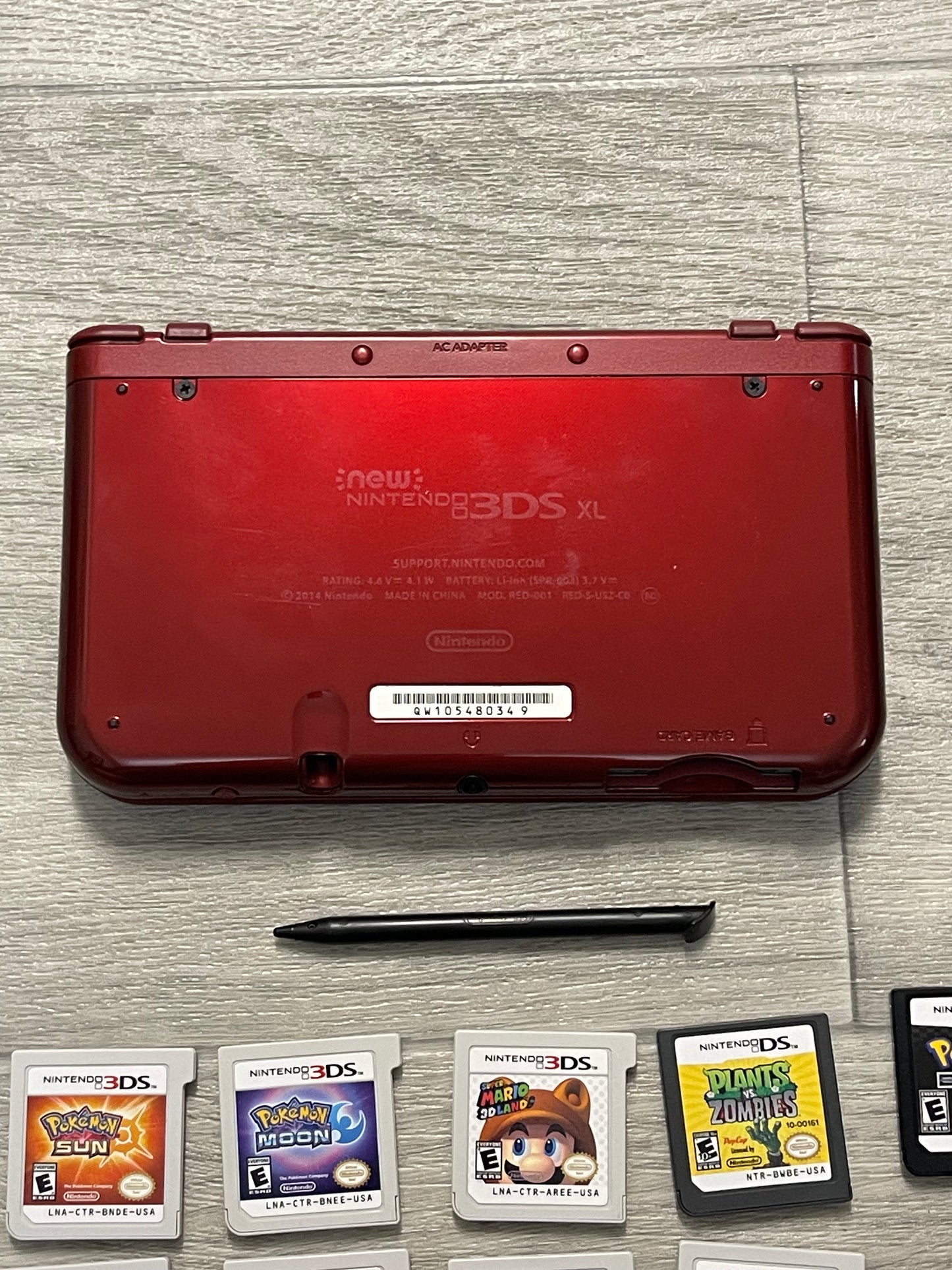 Nintendo New 3DS XL Gaming System  Mint Condition + charger+ Games+case