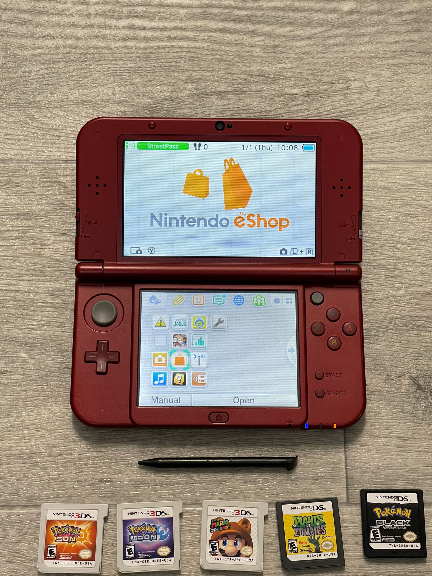 Nintendo New 3DS XL Gaming System  Mint Condition + charger+ Games+case
