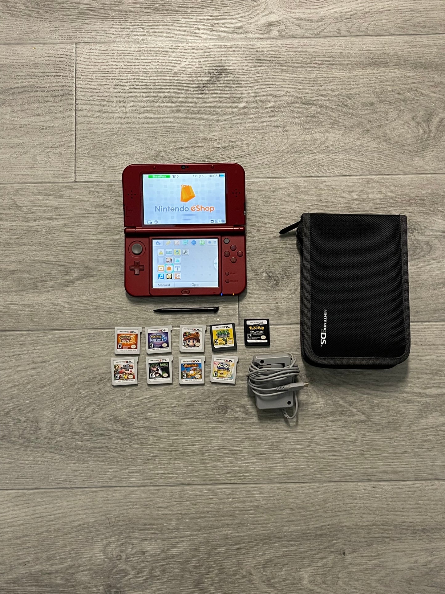 Nintendo New 3DS XL Gaming System  Mint Condition + charger+ Games+case